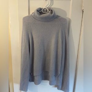 Purple/grey turtleneck sweater. Fabric is soft